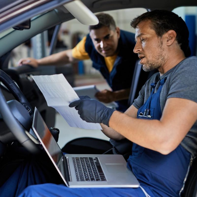auto-mechanic-and-his-coworker-car-s-performance-i-2023-11-27-04-58-38-utc-1.jpg